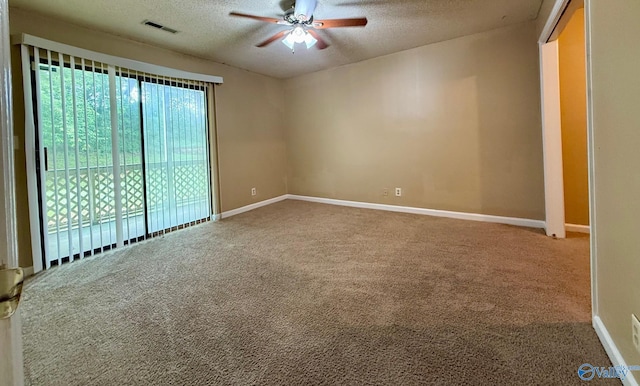 5070 Seven Pine Cir Ground, Unit Ground, Huntsville, AL 35816 - carpeted spare room with a textured ceiling, ceiling fan, and baseboards