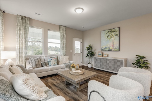 living room featuring dark hardwood / wood-style floors