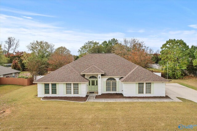 102 Bay Pointe Ln, Madison, AL 35758 - view of front of home with a front yard, a shingled roof, and brick siding
