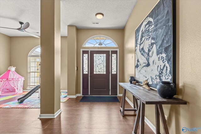 102 Bay Pointe Ln, Madison, AL 35758 - foyer with wood finished floors, a textured ceiling, a ceiling fan, and baseboards