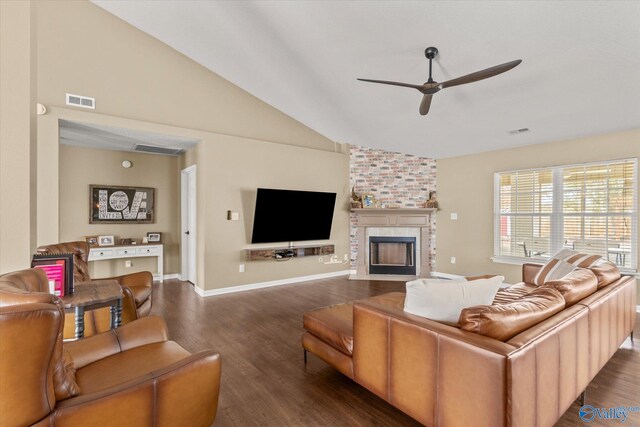 102 Bay Pointe Ln, Madison, AL 35758 - living room with lofted ceiling, wood finished floors, a ceiling fan, a large fireplace, and baseboards