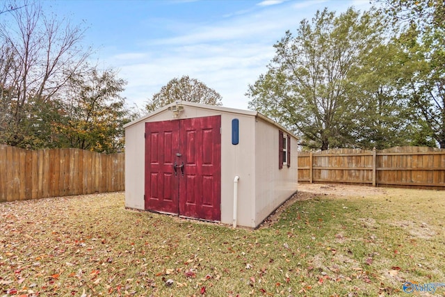 view of outdoor structure with a lawn