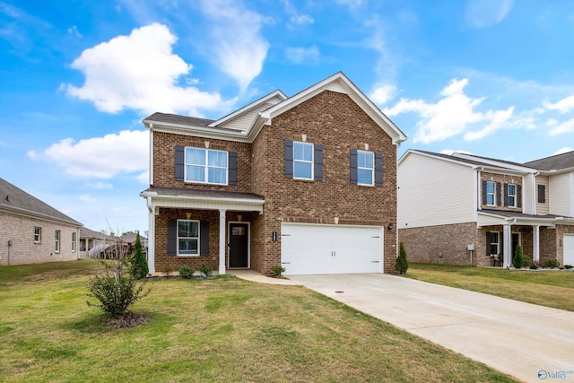 view of front of house with a garage and a front yard