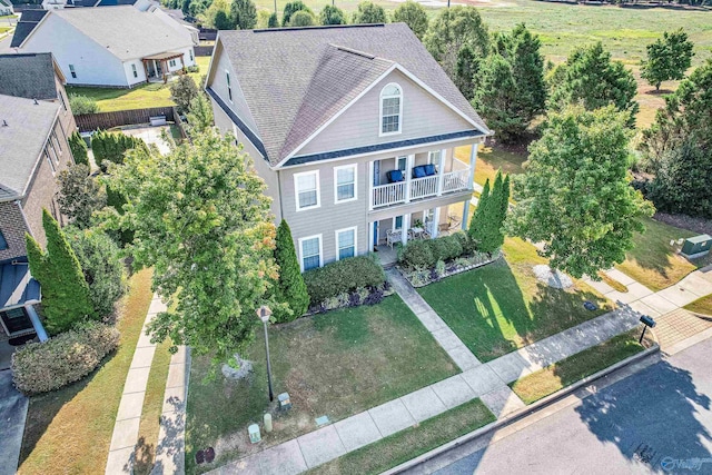 1117 Pegasus Dr NW, Huntsville, AL 35806 - view of front facade featuring a porch, a balcony, and a front yard