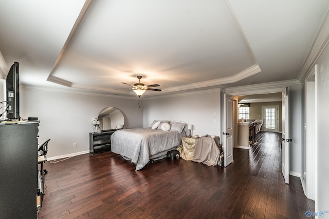 1117 Pegasus Dr NW, Huntsville, AL 35806 - bedroom featuring a tray ceiling, hardwood / wood-style flooring, crown molding, and a ceiling fan