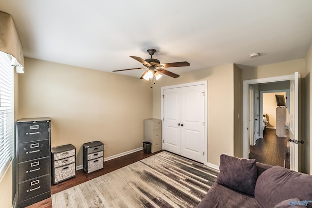 1117 Pegasus Dr NW, Huntsville, AL 35806 - living area with ceiling fan and wood finished floors