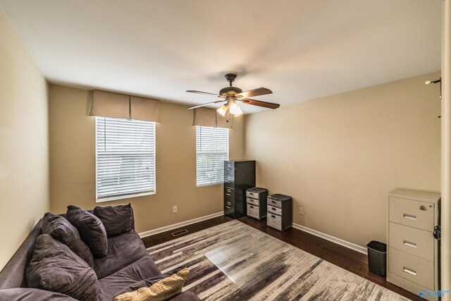 1117 Pegasus Dr NW, Huntsville, AL 35806 - living area with ceiling fan and dark wood-style floors