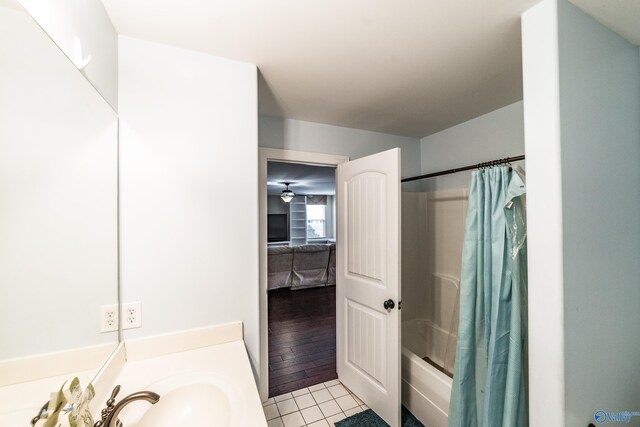 1117 Pegasus Dr NW, Huntsville, AL 35806 - kitchen with appliances with stainless steel finishes, crown molding, a peninsula, dark brown cabinetry, and a kitchen breakfast bar