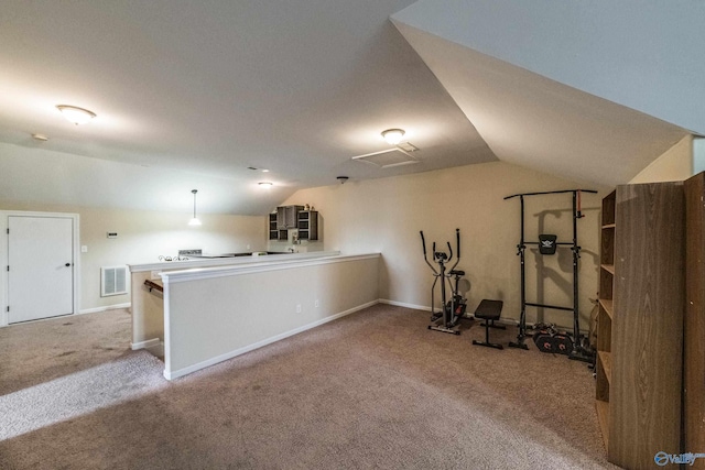 1117 Pegasus Dr NW, Huntsville, AL 35806 - workout area featuring lofted ceiling and carpet