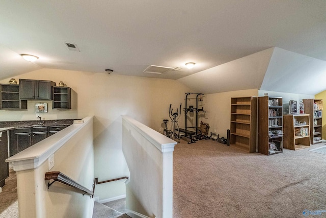 1117 Pegasus Dr NW, Huntsville, AL 35806 - interior space featuring lofted ceiling, carpet, and attic access