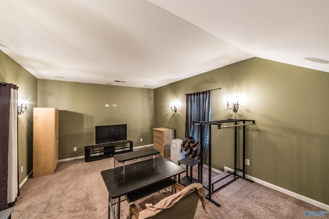 1117 Pegasus Dr NW, Huntsville, AL 35806 - carpeted living area featuring vaulted ceiling and baseboards
