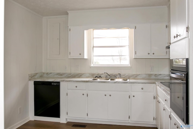 kitchen with white cabinets, black dishwasher, and a sink