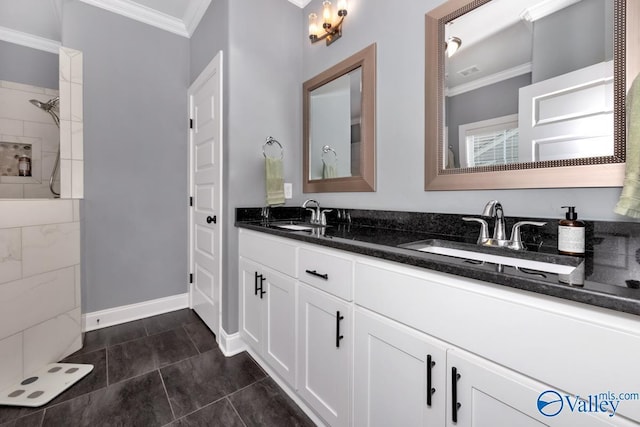 bathroom featuring crown molding, vanity, and tile patterned flooring