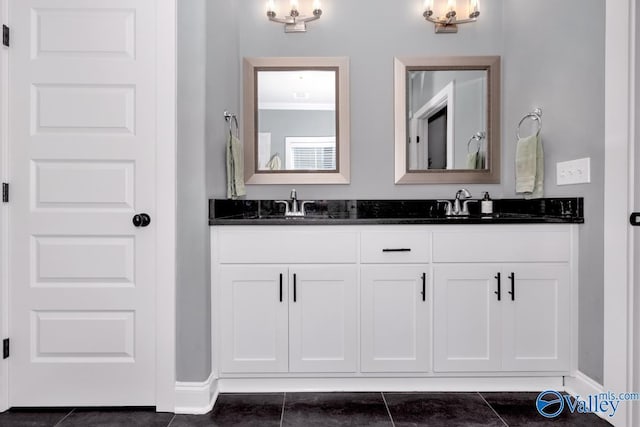 bathroom featuring vanity and tile patterned flooring