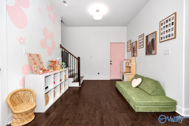 living area featuring dark hardwood / wood-style floors