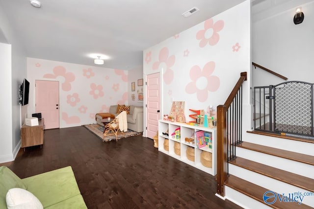 recreation room with hardwood / wood-style flooring