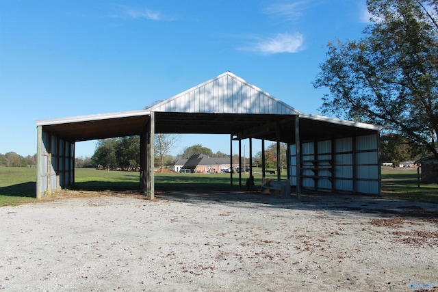 surrounding community featuring a detached carport