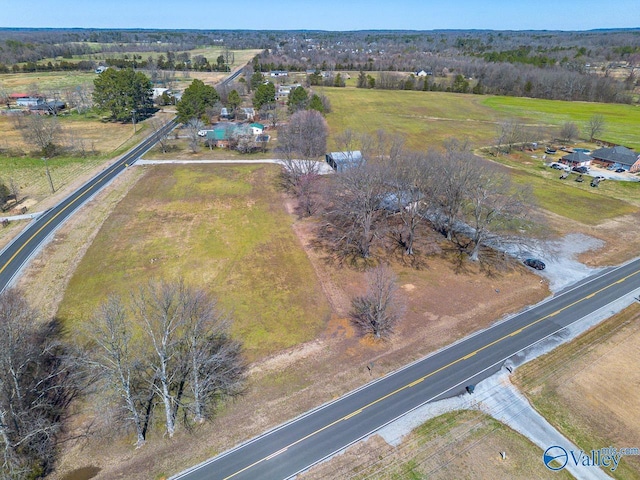 birds eye view of property featuring a rural view