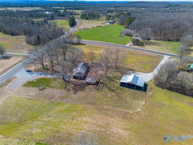 birds eye view of property featuring a rural view