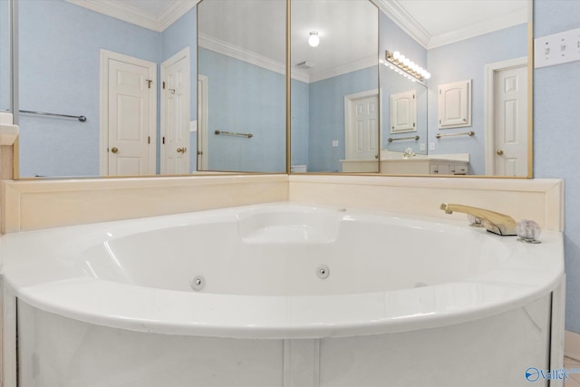 bathroom featuring vanity, a bath, and ornamental molding