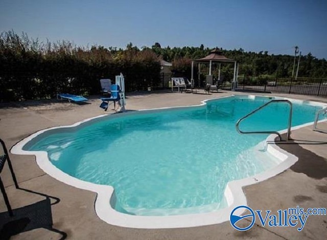 view of pool with a gazebo and a patio area