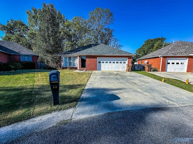 ranch-style home with a front yard and a garage