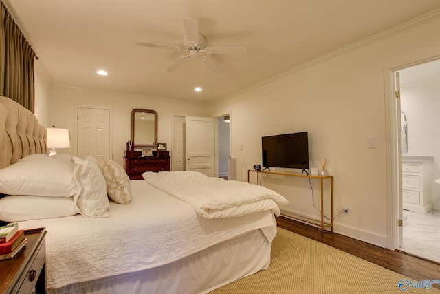 bedroom featuring crown molding, wood-type flooring, and ceiling fan