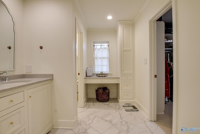 bathroom with vanity and crown molding