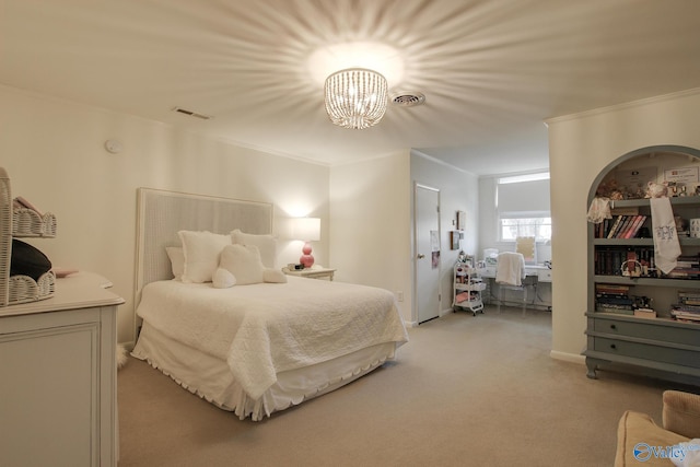 bedroom with crown molding and light carpet