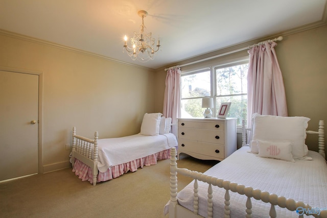 carpeted bedroom featuring crown molding and an inviting chandelier