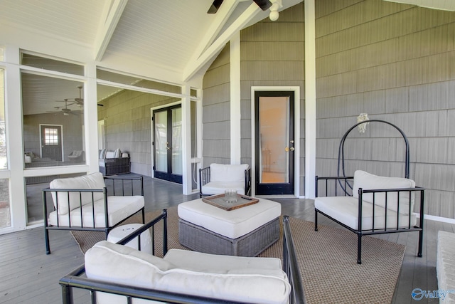 view of patio / terrace with ceiling fan and an outdoor living space