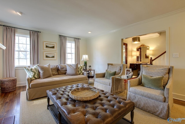 living room featuring hardwood / wood-style floors and ornamental molding