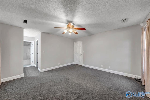 carpeted empty room featuring a textured ceiling and ceiling fan