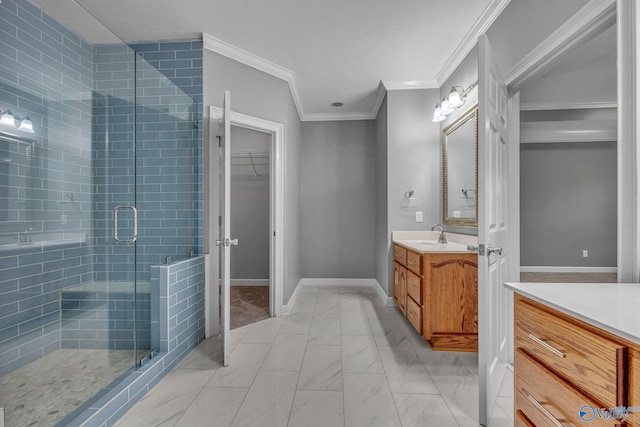 bathroom with vanity, walk in shower, and ornamental molding