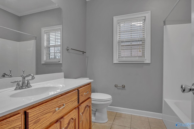 full bathroom featuring ornamental molding, bathtub / shower combination, vanity, tile patterned flooring, and toilet