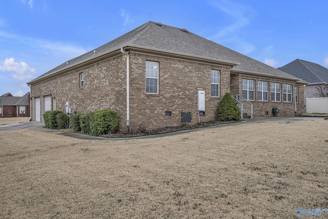 back of house featuring central AC