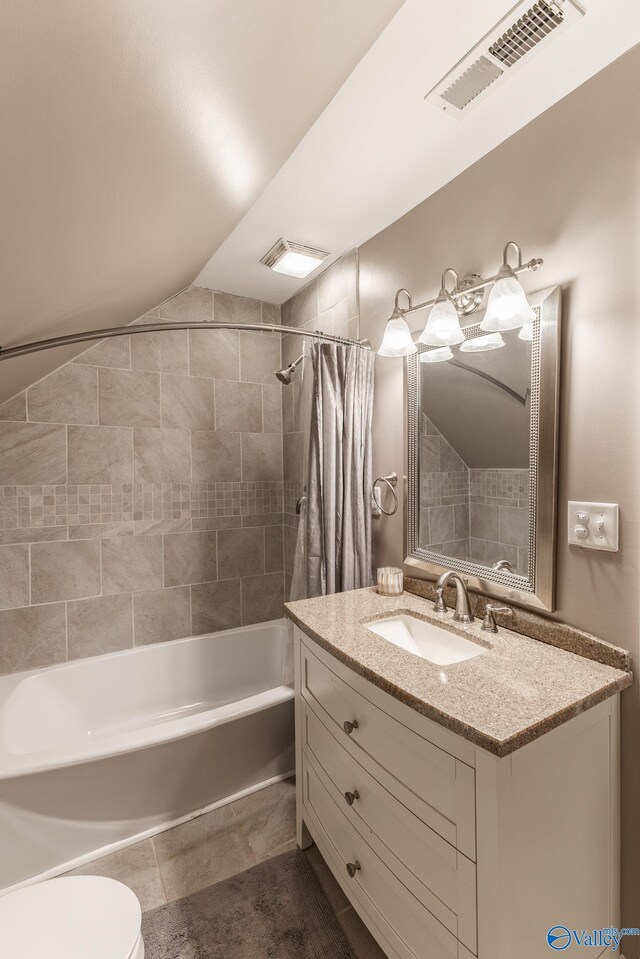 14690 Birchbark St, Athens, AL 35613 - full bathroom with visible vents, tile patterned flooring, vanity, toilet, and shower / bath combo with shower curtain
