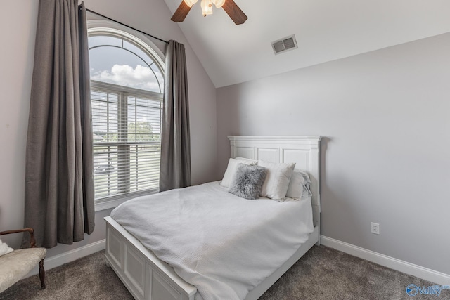 14690 Birchbark St, Athens, AL 35613 - bedroom featuring ceiling fan, visible vents, vaulted ceiling, baseboards, and dark colored carpet