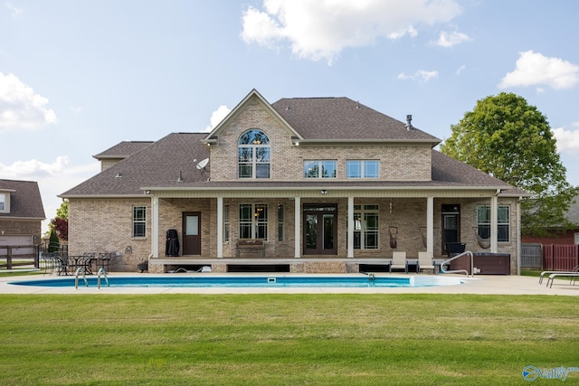 14690 Birchbark St, Athens, AL 35613 - rear view of property with a yard, fence, a fenced in pool, and roof with shingles