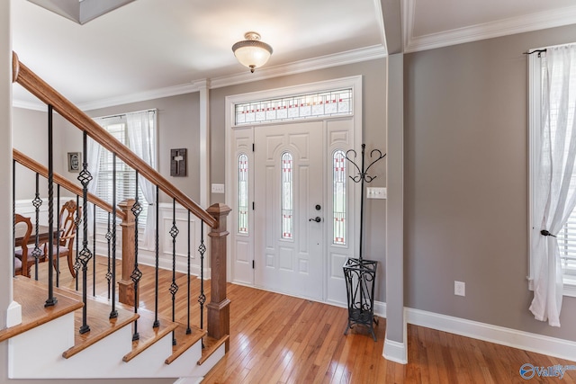 14690 Birchbark St, Athens, AL 35613 - foyer with stairs, baseboards, ornamental molding, and light wood-style flooring