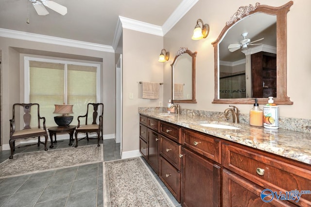 bathroom featuring ornamental molding, vanity, ceiling fan, and an enclosed shower