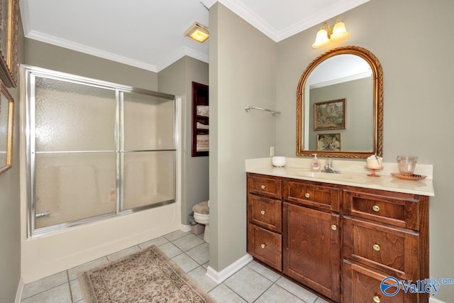 full bathroom with vanity, enclosed tub / shower combo, tile patterned flooring, ornamental molding, and toilet