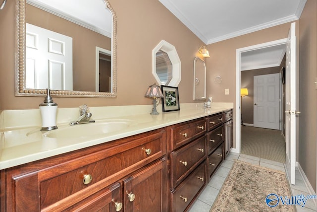 bathroom with ornamental molding, vanity, and tile patterned floors