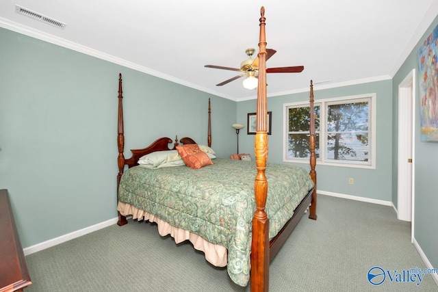 carpeted bedroom featuring ornamental molding and ceiling fan