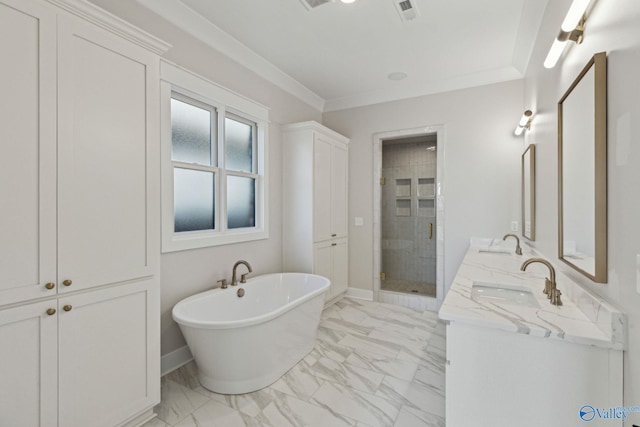 bathroom with crown molding, vanity, and independent shower and bath