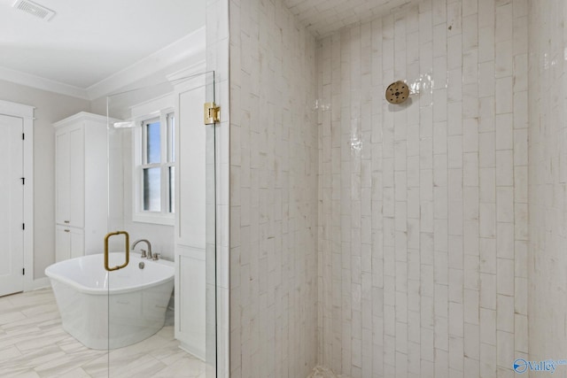 bathroom featuring ornamental molding and independent shower and bath