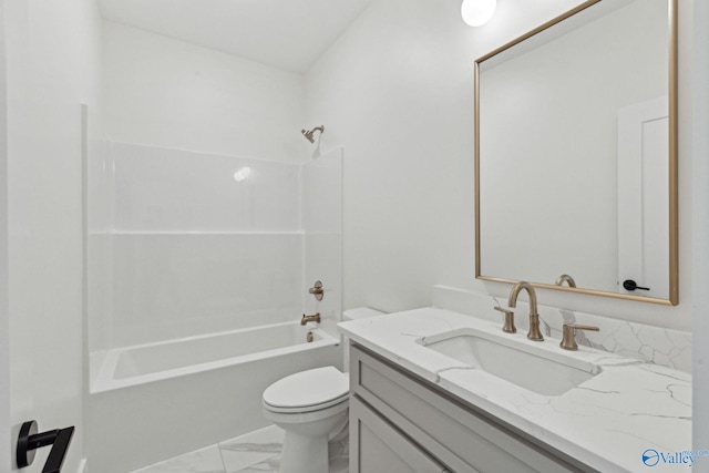 full bathroom featuring shower / washtub combination, vanity, and toilet