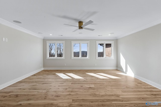 unfurnished room with crown molding, ceiling fan, and light wood-type flooring