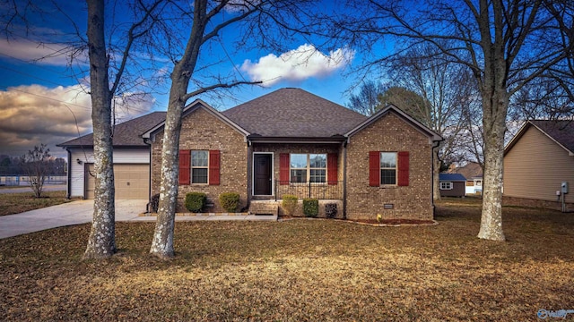 view of front facade with a garage and a lawn