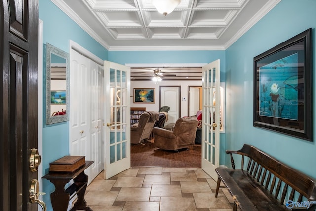 corridor with ornamental molding, light tile patterned floors, and french doors